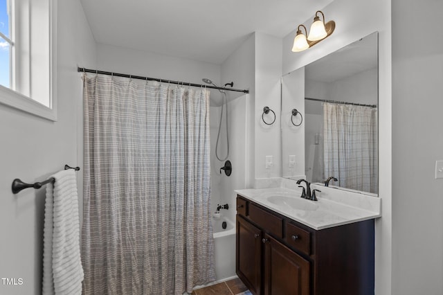 bathroom featuring vanity and shower / tub combo with curtain