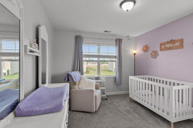 bedroom with visible vents, baseboards, and carpet floors