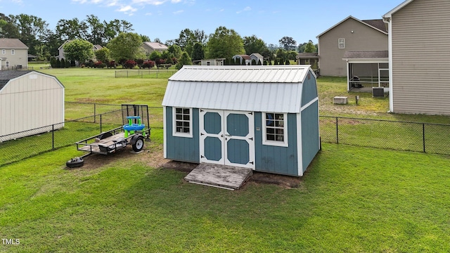 view of shed featuring a fenced backyard