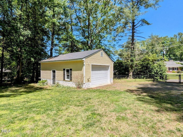 detached garage with fence
