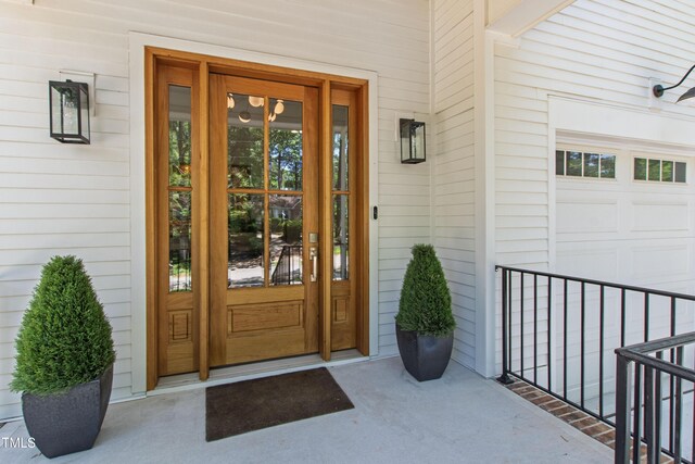 doorway to property featuring a porch
