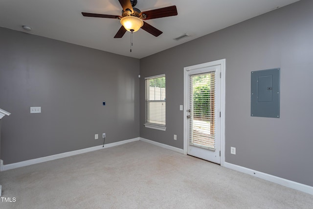 8719 Cypress Grove Run, Raleigh, NC 27612 - empty room with ceiling fan, electric panel, visible vents, light colored carpet, and baseboards