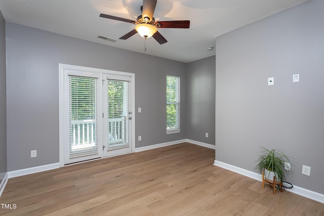 8719 Cypress Grove Run, Raleigh, NC 27612 - spare room featuring visible vents, a ceiling fan, baseboards, and light wood-type flooring