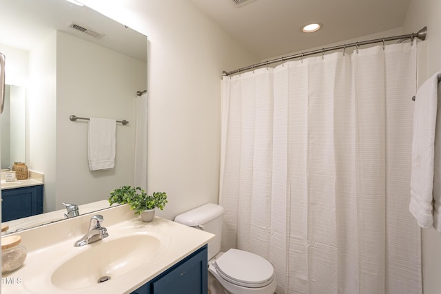 8719 Cypress Grove Run, Raleigh, NC 27612 - full bathroom featuring visible vents, recessed lighting, toilet, and vanity