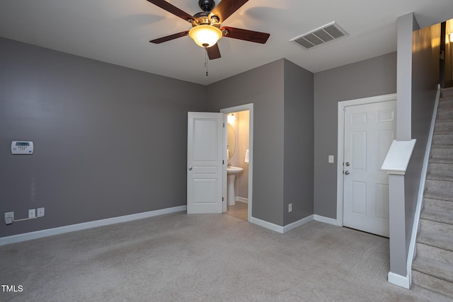 8719 Cypress Grove Run, Raleigh, NC 27612 - unfurnished bedroom featuring visible vents, carpet flooring, baseboards, and connected bathroom