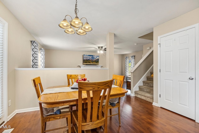 1984 Sadler Ave, Creedmoor, NC 27522 - dining space with wood finished floors, a chandelier, a ceiling fan, and baseboards