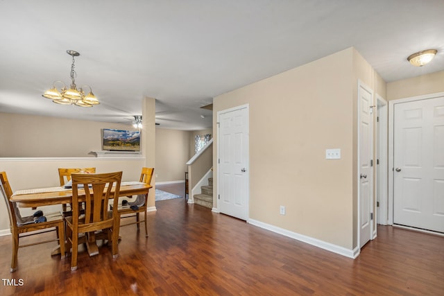 1984 Sadler Ave, Creedmoor, NC 27522 - dining area featuring baseboards, wood finished floors, stairs, a chandelier, and ceiling fan