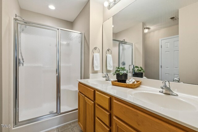 1984 Sadler Ave, Creedmoor, NC 27522 - full bathroom with a shower stall and double vanity