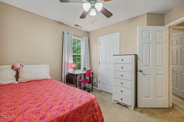 1984 Sadler Ave, Creedmoor, NC 27522 - bedroom featuring light carpet, ceiling fan, and baseboards
