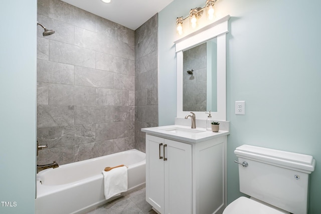 bathroom with vanity, shower / tub combination, and toilet