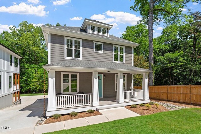 3932 Old Chapel Hill Rd, Durham, NC 27707 - traditional style home with covered porch, fence, a shingled roof, and concrete driveway