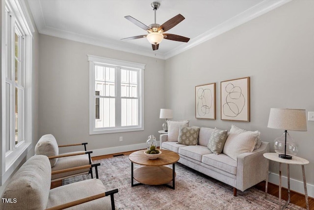 3932 Old Chapel Hill Rd, Durham, NC 27707 - living room with crown molding, wood finished floors, baseboards, and a ceiling fan