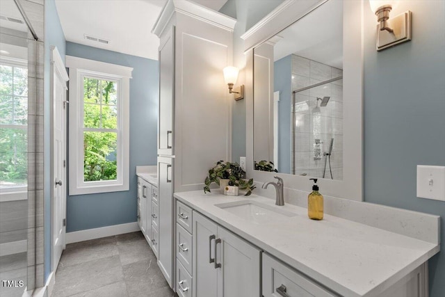 3932 Old Chapel Hill Rd, Durham, NC 27707 - bathroom featuring vanity, visible vents, baseboards, and a shower stall