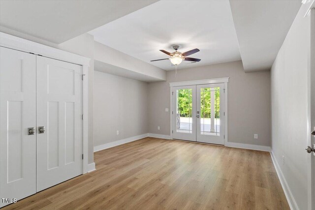 3932 Old Chapel Hill Rd, Durham, NC 27707 - unfurnished room featuring light wood finished floors, french doors, baseboards, and ceiling fan