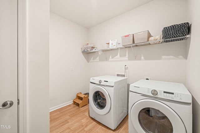 2404 Azalea Dr, Durham, NC 27703 - washroom featuring light wood-style floors, independent washer and dryer, and baseboards