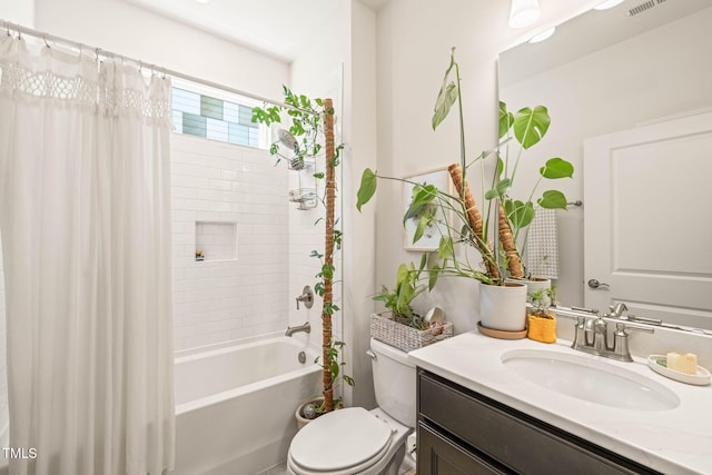 2404 Azalea Dr, Durham, NC 27703 - full bath with vanity, shower / tub combo, and toilet