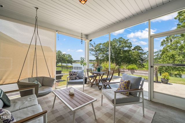 2404 Azalea Dr, Durham, NC 27703 - sunroom with an outdoor living space, plenty of natural light, and a water view