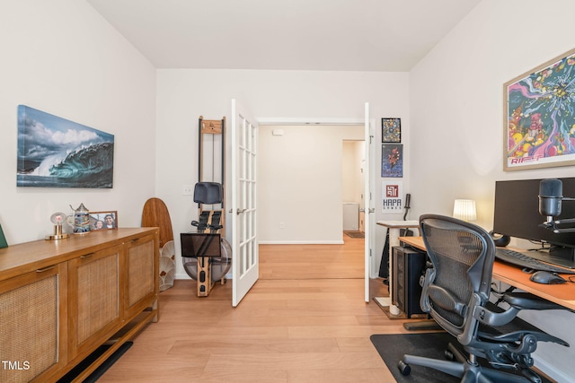 2404 Azalea Dr, Durham, NC 27703 - office area with light wood finished floors and french doors