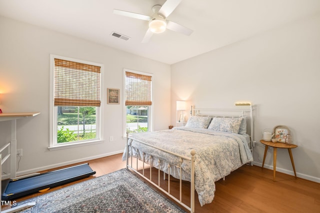 2404 Azalea Dr, Durham, NC 27703 - bedroom featuring wood finished floors, baseboards, and ceiling fan