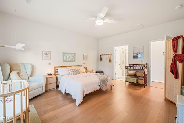 2404 Azalea Dr, Durham, NC 27703 - bedroom featuring light wood-type flooring, ceiling fan, and ensuite bath
