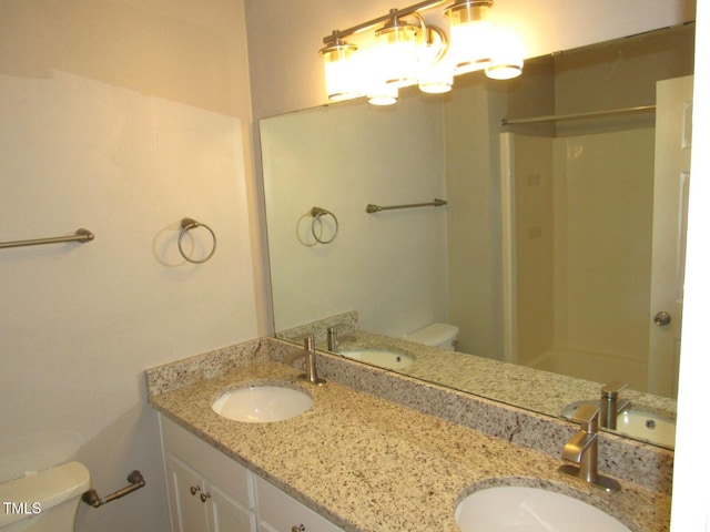 bathroom featuring a sink and toilet