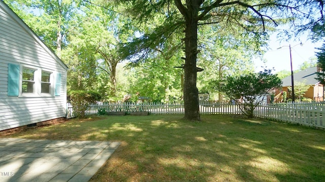 view of yard featuring a fenced backyard