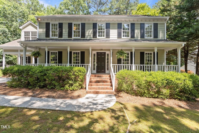 128 Cobblestone Dr, Chapel Hill, NC 27516 - colonial inspired home featuring a porch