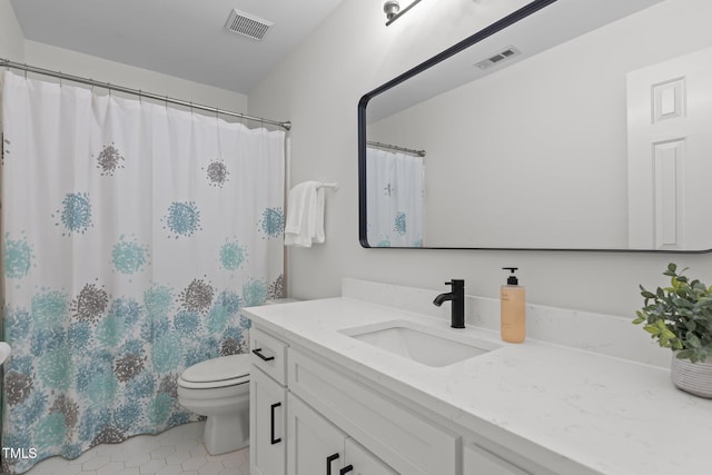 128 Cobblestone Dr, Chapel Hill, NC 27516 - bathroom featuring vanity, toilet, tile patterned flooring, and a shower with curtain