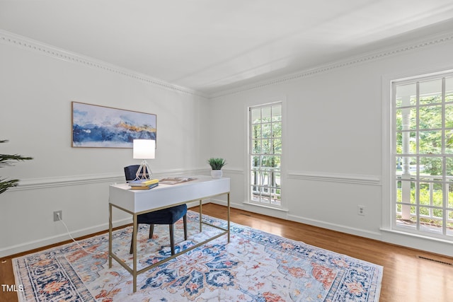 128 Cobblestone Dr, Chapel Hill, NC 27516 - home office with wood finished floors, ornamental molding, and baseboards