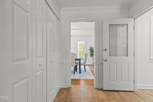 128 Cobblestone Dr, Chapel Hill, NC 27516 - foyer with crown molding, baseboards, and tile patterned floors