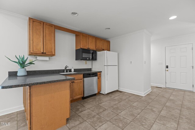 128 Cobblestone Dr, Chapel Hill, NC 27516 - kitchen featuring dishwasher, black microwave, freestanding refrigerator, ornamental molding, and dark countertops