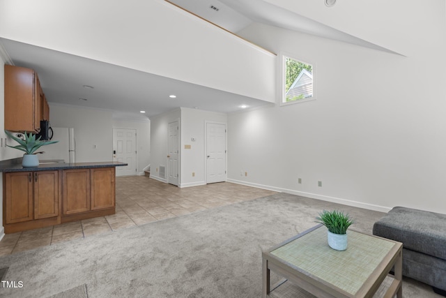 128 Cobblestone Dr, Chapel Hill, NC 27516 - living area with light carpet, light tile patterned floors, baseboards, and recessed lighting