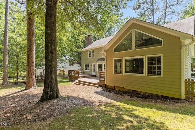128 Cobblestone Dr, Chapel Hill, NC 27516 - back of property with a deck, crawl space, ceiling fan, roof with shingles, and a chimney