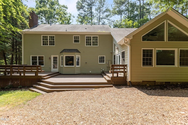 128 Cobblestone Dr, Chapel Hill, NC 27516 - rear view of property with a chimney, crawl space, a deck, and roof with shingles