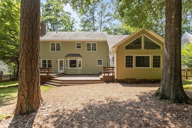 128 Cobblestone Dr, Chapel Hill, NC 27516 - back of property with a wooden deck, a chimney, and crawl space