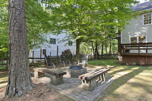 128 Cobblestone Dr, Chapel Hill, NC 27516 - view of yard featuring a fire pit and a wooden deck