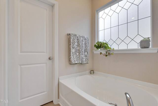 full bathroom featuring a garden tub