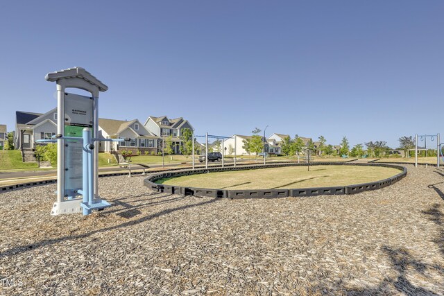 view of playground featuring a residential view