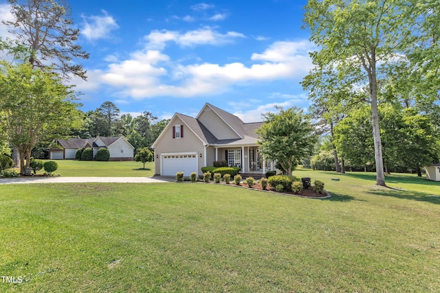 view of front facade with a garage, driveway, and a front yard