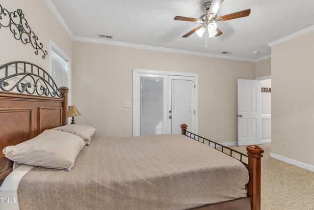 bedroom featuring visible vents, ornamental molding, carpet, and ceiling fan