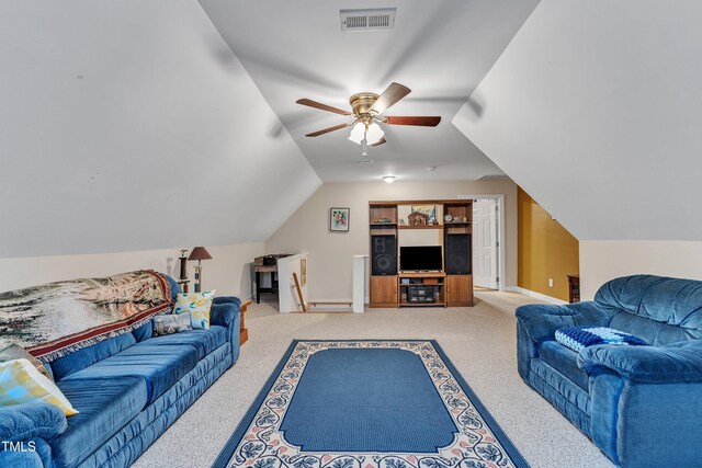 living area featuring vaulted ceiling, carpet, a ceiling fan, and visible vents