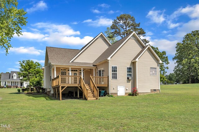 back of property featuring a lawn, crawl space, stairs, and roof with shingles