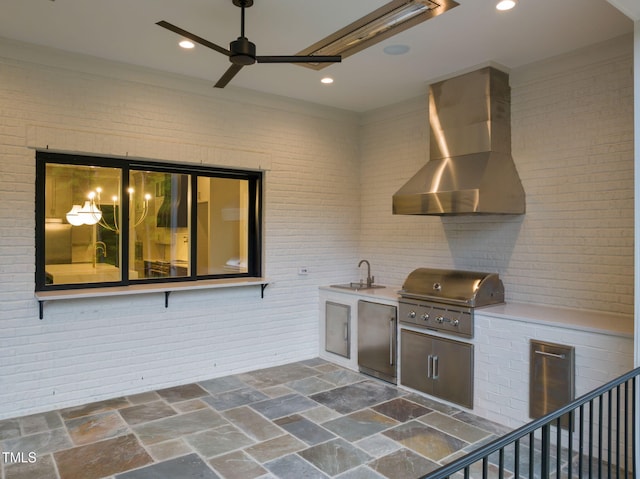 view of patio featuring a sink, an outdoor kitchen, ceiling fan, and a grill