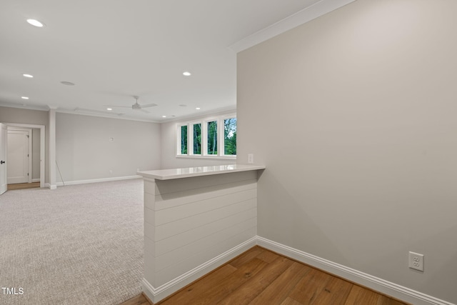 interior space featuring baseboards, recessed lighting, and crown molding