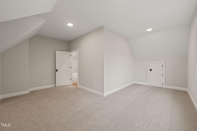 bonus room with carpet, vaulted ceiling, and recessed lighting