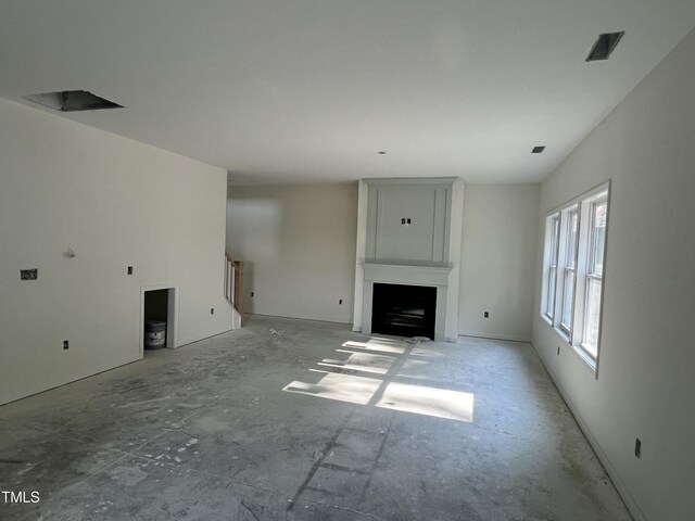 183 Pecan Valley Way, Four Oaks, NC 27524 - unfurnished living room featuring a large fireplace