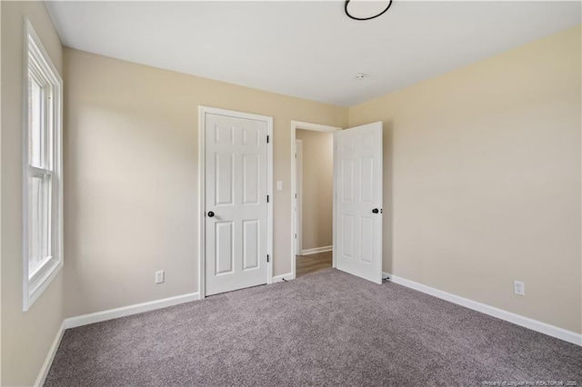11504 Bissette Rd, Middlesex, NC 27557 - unfurnished bedroom featuring baseboards and carpet flooring