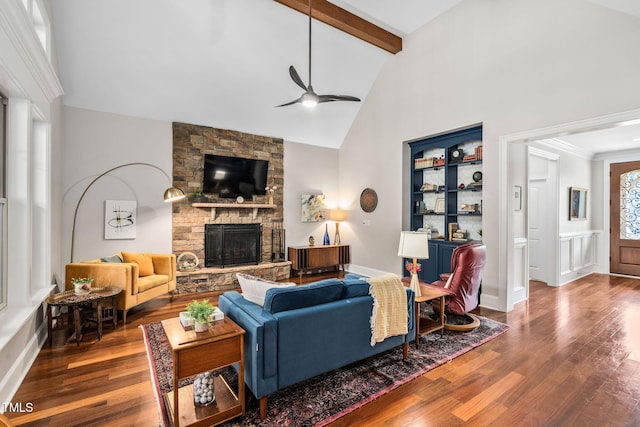 154 Sicily Dr, Clayton, NC 27527 - living area featuring a ceiling fan, wood finished floors, a fireplace, beamed ceiling, and high vaulted ceiling