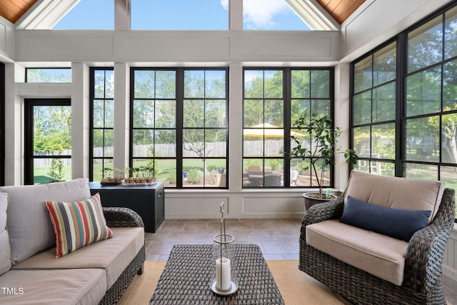 154 Sicily Dr, Clayton, NC 27527 - sunroom featuring vaulted ceiling and stone tile flooring