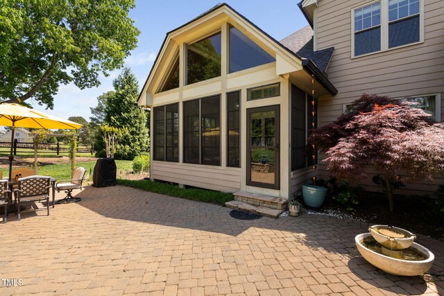 154 Sicily Dr, Clayton, NC 27527 - view of patio featuring a sunroom